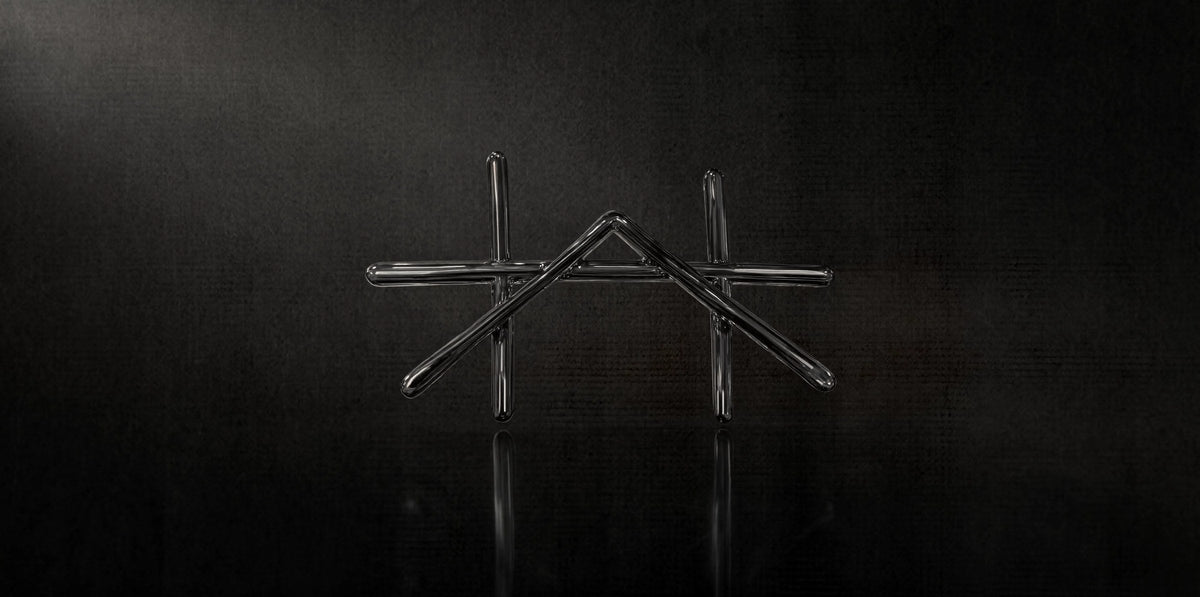 Whisker & Ash sigil in chrome on black – The Almanac